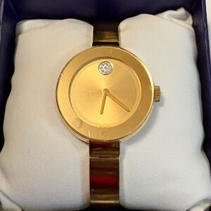 Movado bold gold watch womens